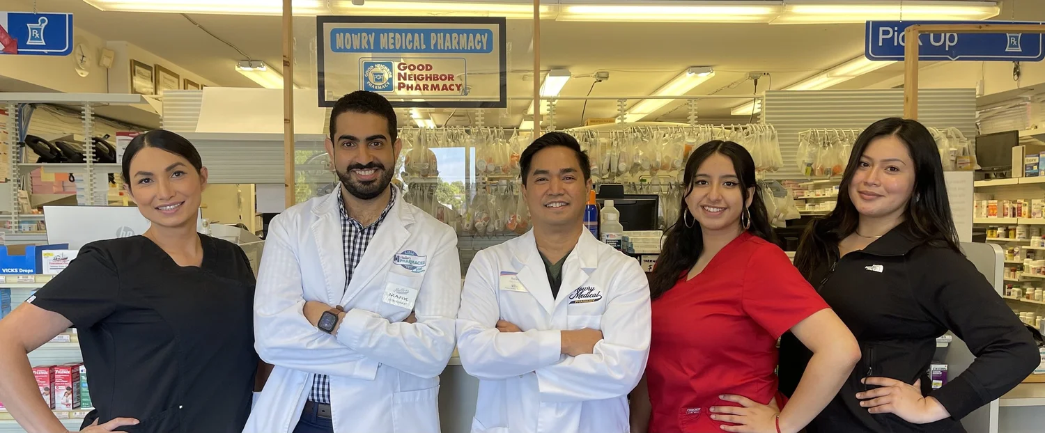 Pharmacist consulting with a customer at Mowry Medical Pharmacy